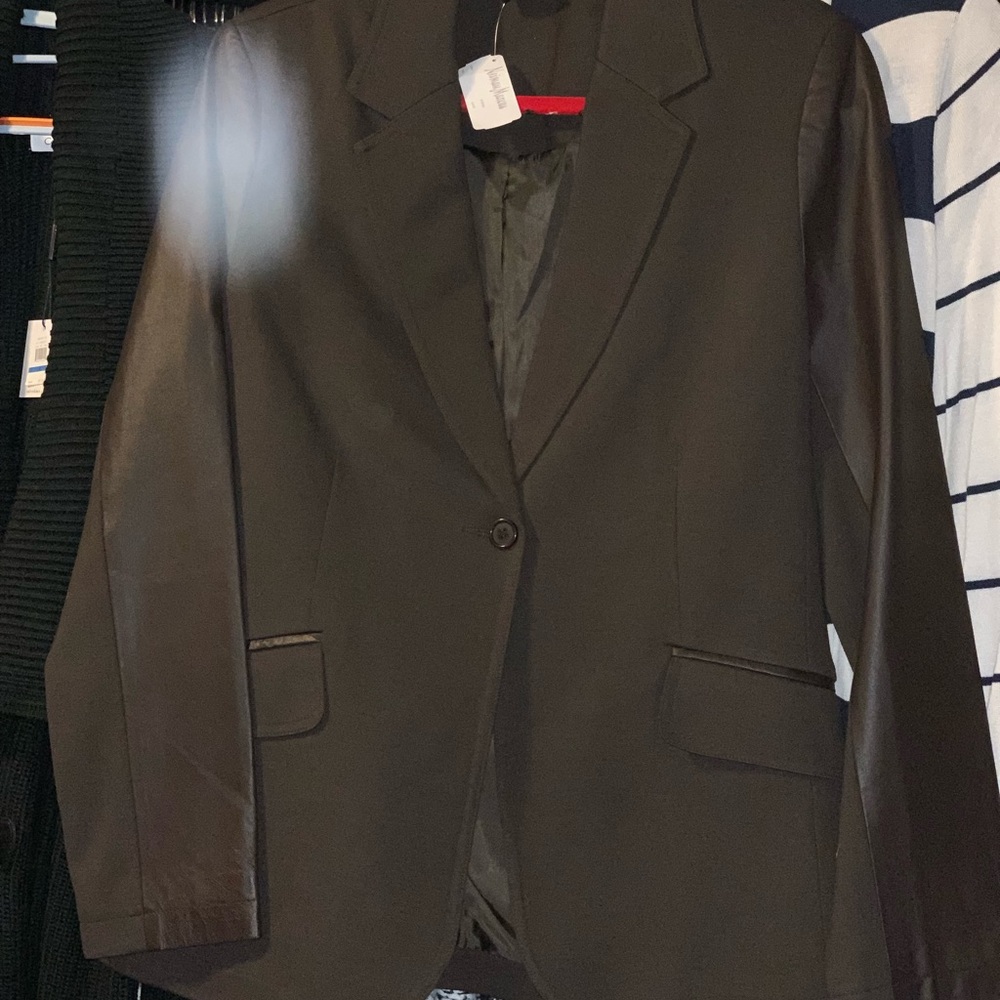 Blazer:  lined, pointe with genuine leather trim.